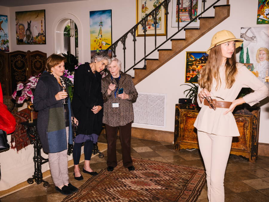 Woman wearing khaki outfit at a fashion show for the Charleston Literary Festival in South Carolina