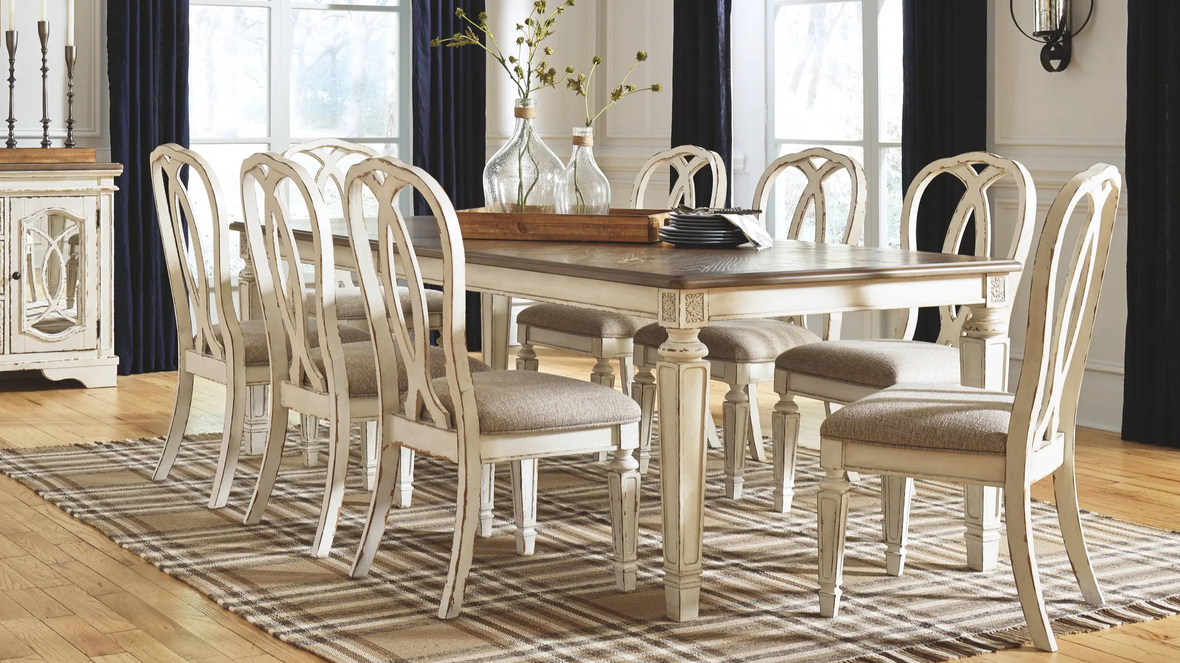 A farmhouse-style dining table with matching decor.