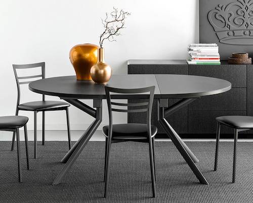 20 Expandable Tables You Ll Need For, Modern Round Extending Dining Table And Chairs