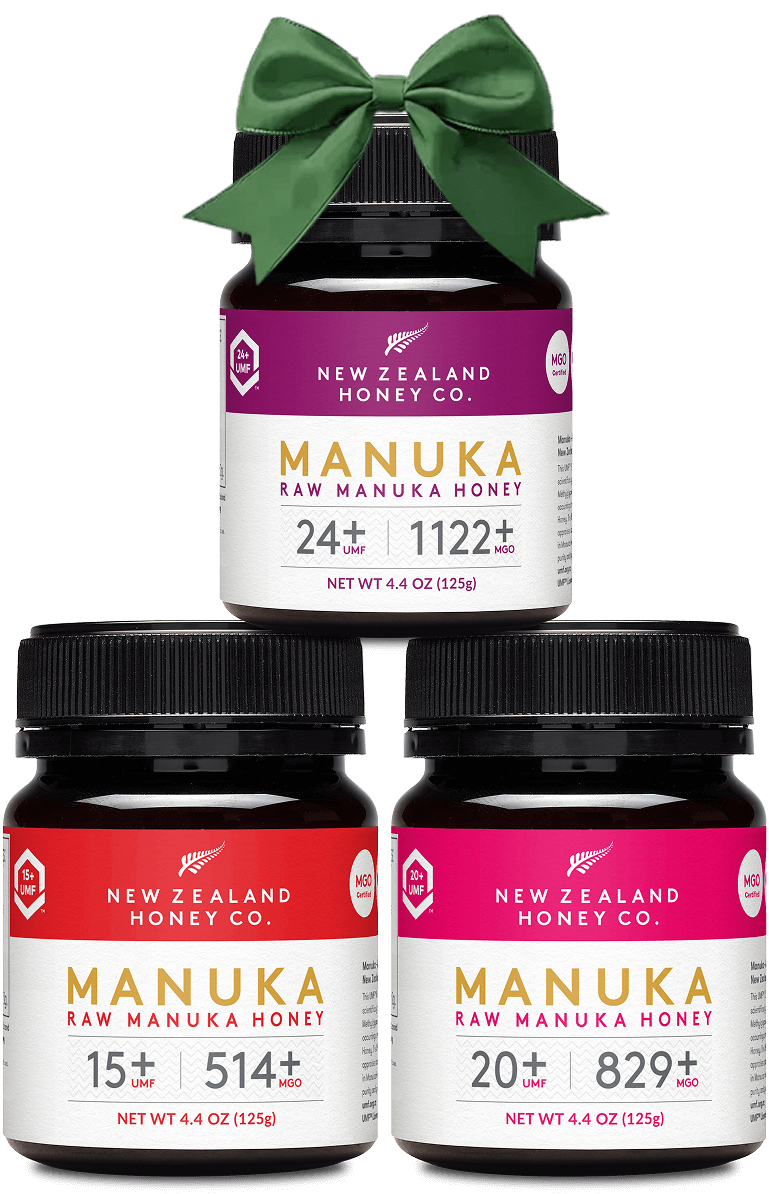 Three jars of Manuka honey with different UMF ratings.