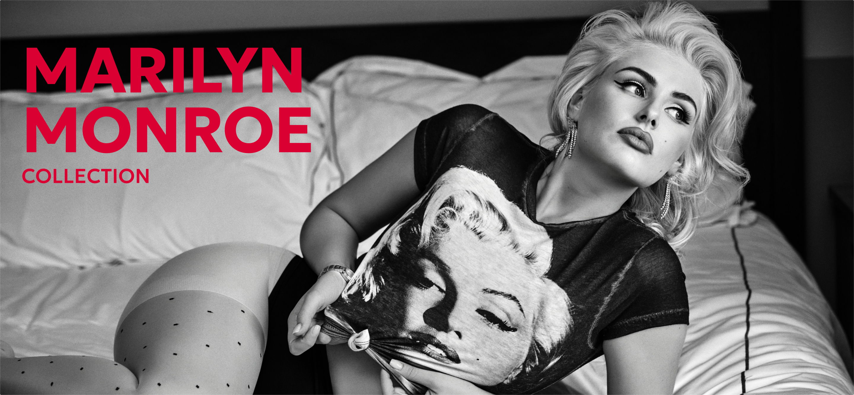 Woman in bed holding a Marilyn Monroe shirt, with text overlay.