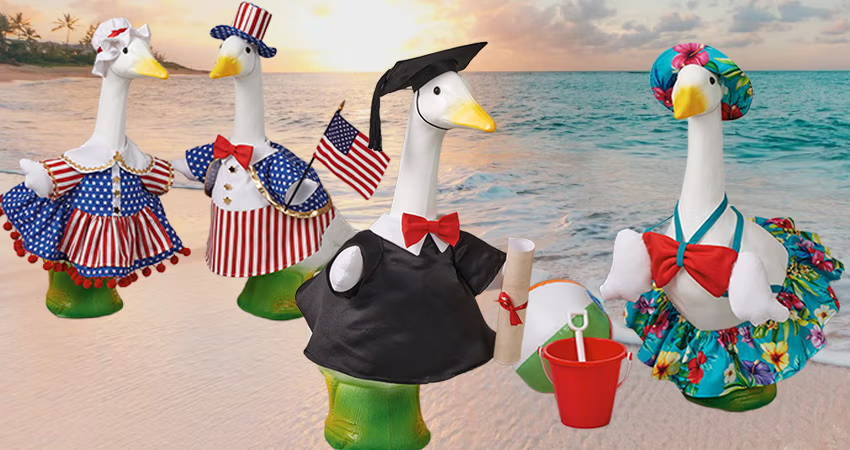 Four decorated ducks on a beach, celebrating different occasions.