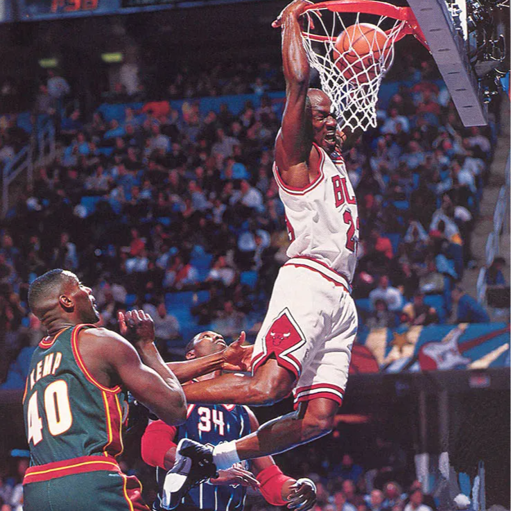 michael jordan dunking a basketball side view