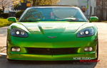 Front-facing lime green Chevrolet Corvette C6 headlights on Rajiv's 2008 Chevy Corvette Conductor's Special 228H train horn kit featured customer install gallery photo 1