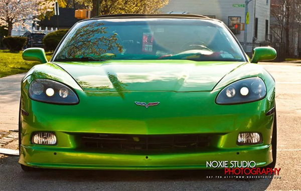Front-facing lime green Chevrolet Corvette C6 headlights on Rajiv's 2008 Chevy Corvette Conductor's Special 228H train horn kit featured customer install gallery photo 1