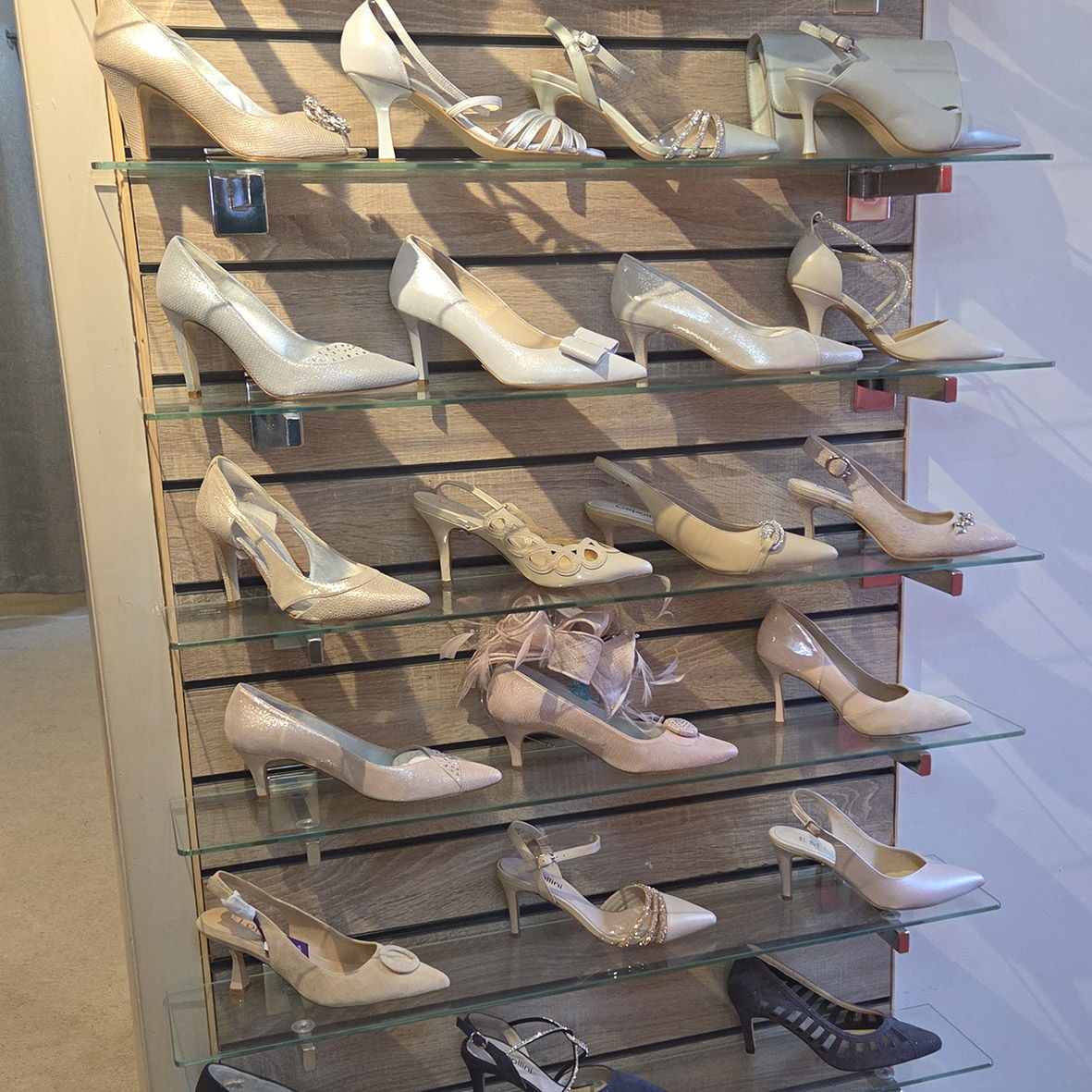 a large selection of shoes for the mother of the bride