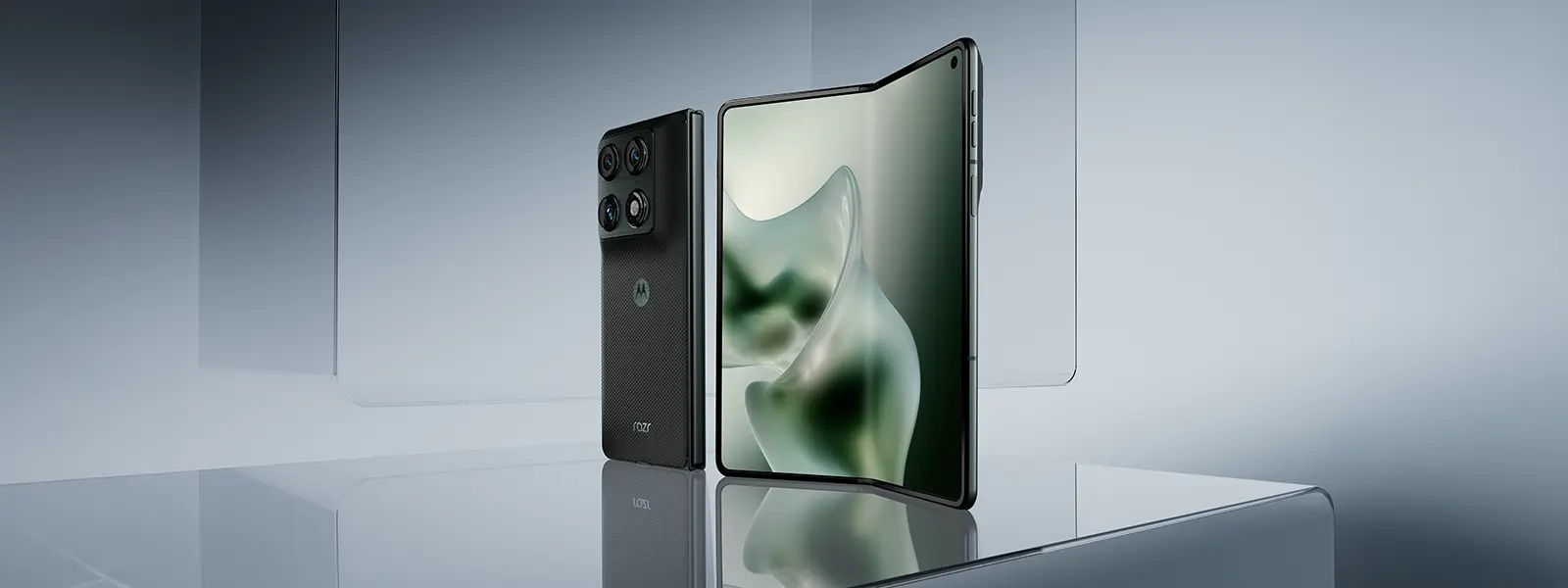 A modern smartphone displayed at an angle on a reflective surface.