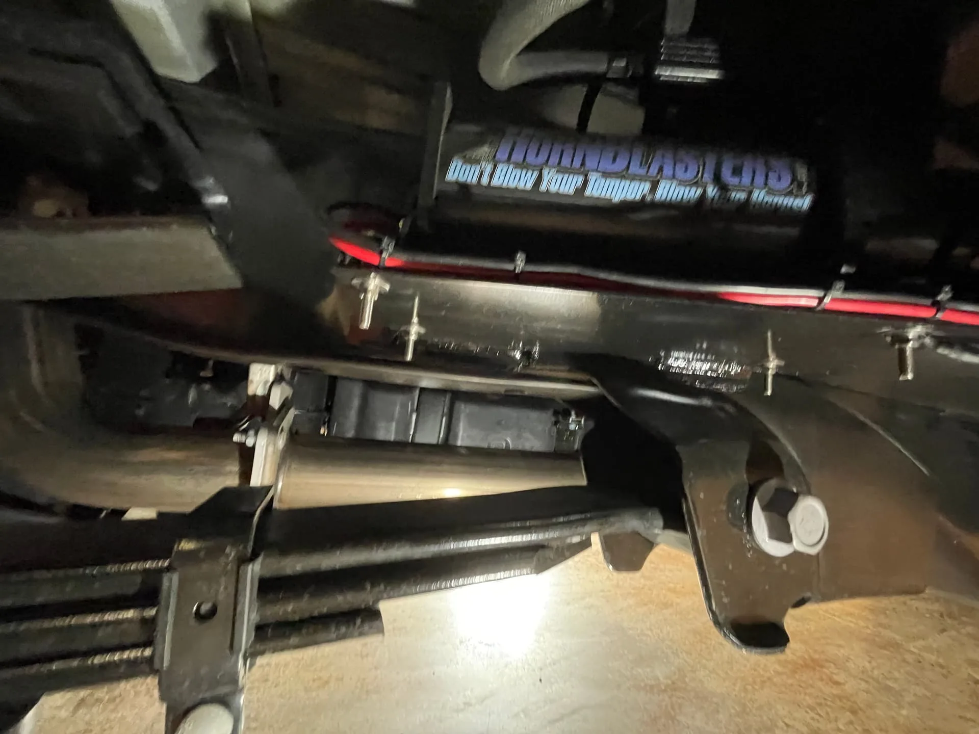 Black HornBlasters air tank mounted on undercarriage bracket with red air line photo 12