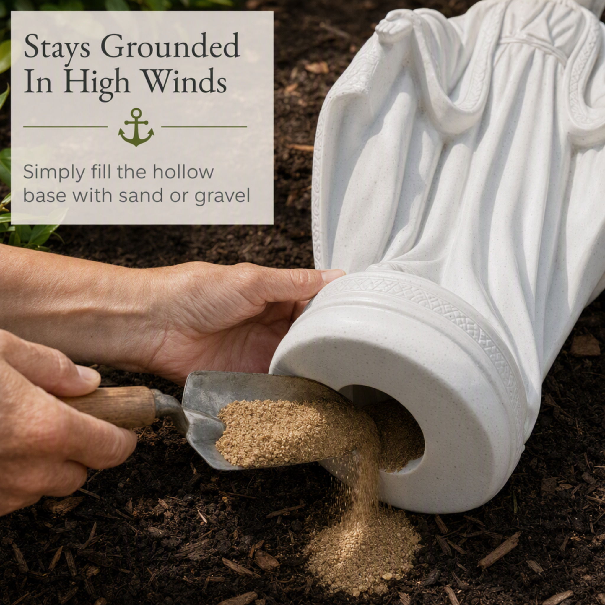 Person putting sand in the bottom fill hole of the Virgin Mary garden statue for stability