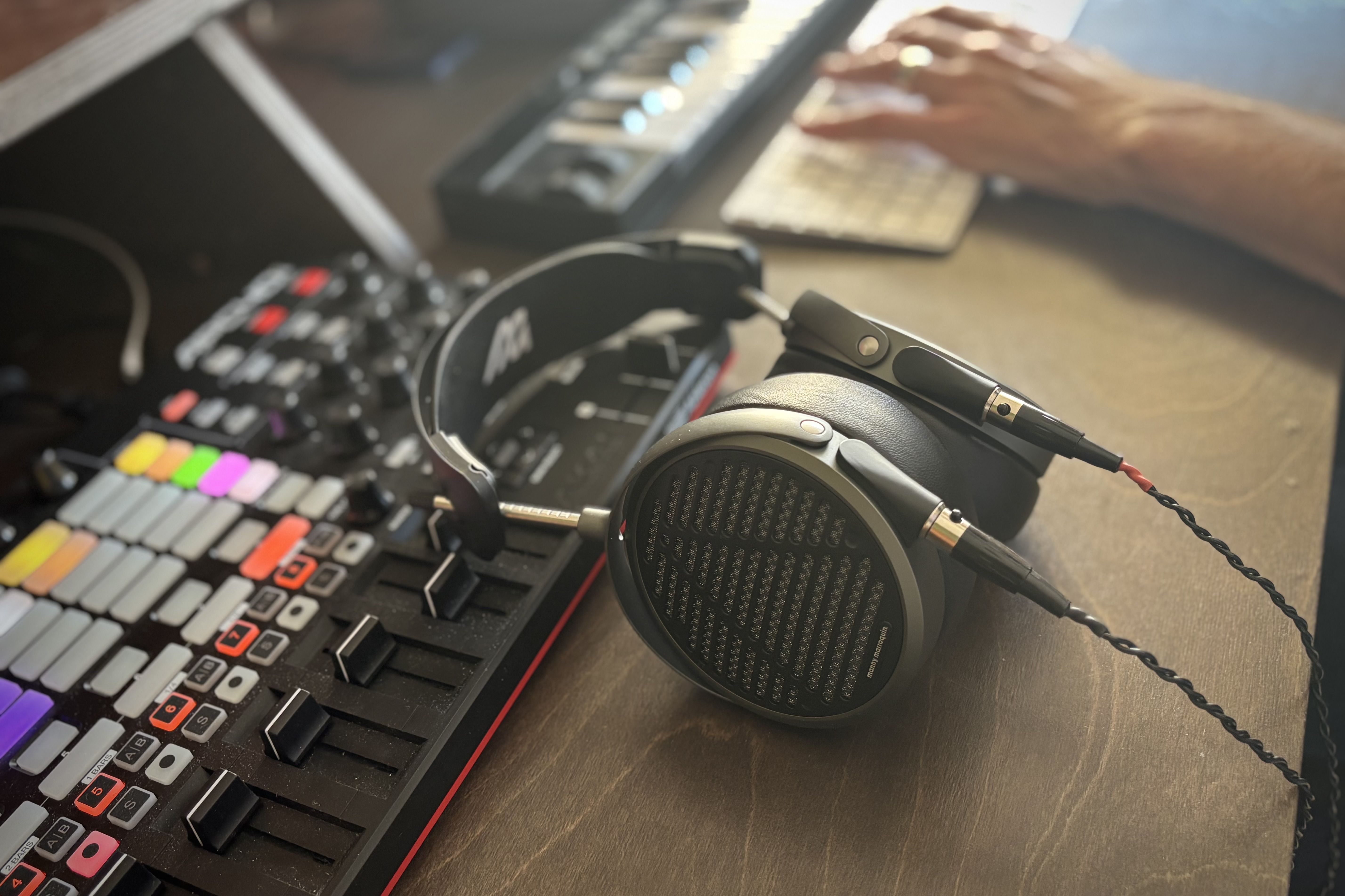 Audeze Mm-500 headphones laying on the table in the studio