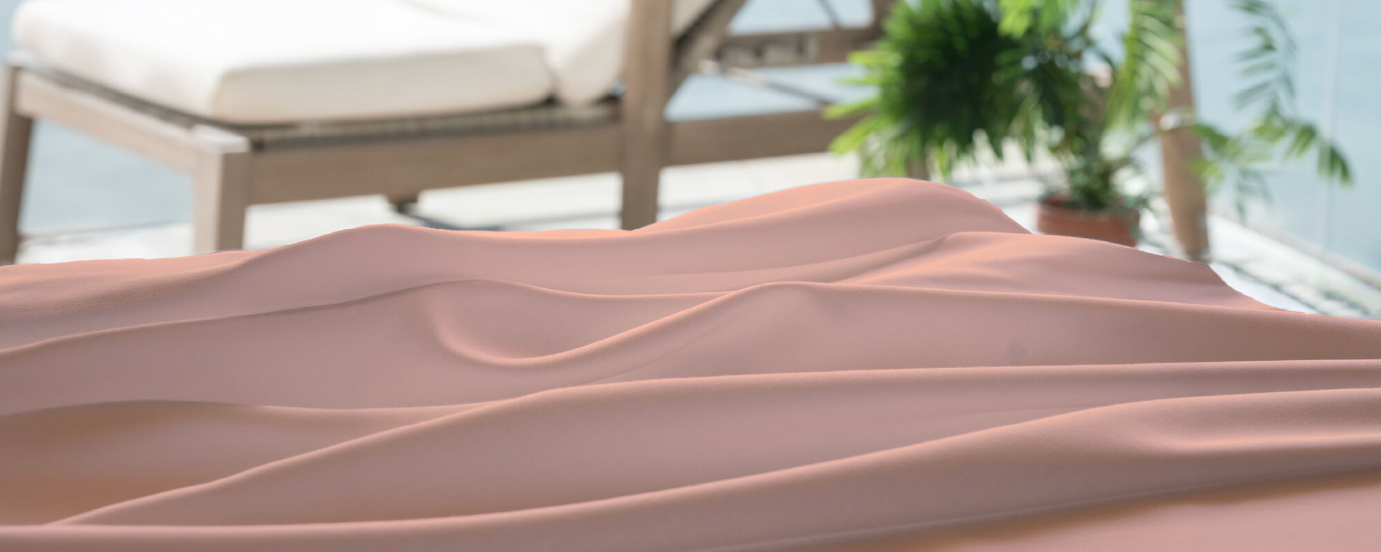 pink bamboo bed sheets on a bed