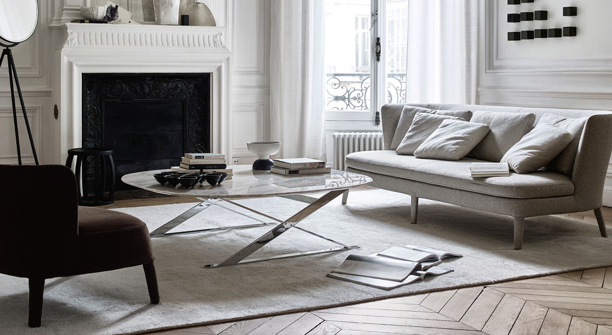 Modern living room with a Maxalto sofa, coffee table, and stylish decor.