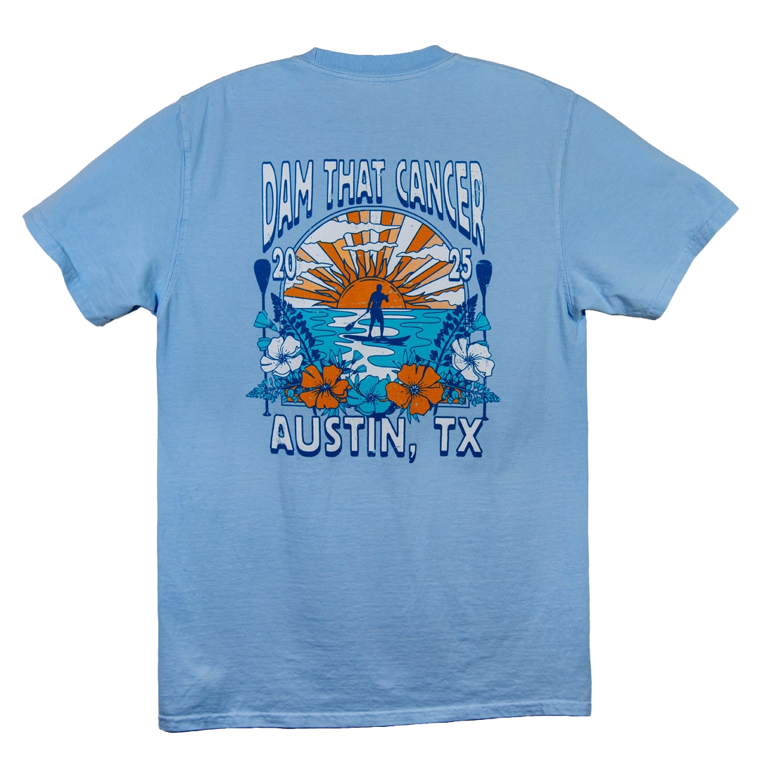 Light blue t-shirt with graphic design featuring flowers and sun, 
