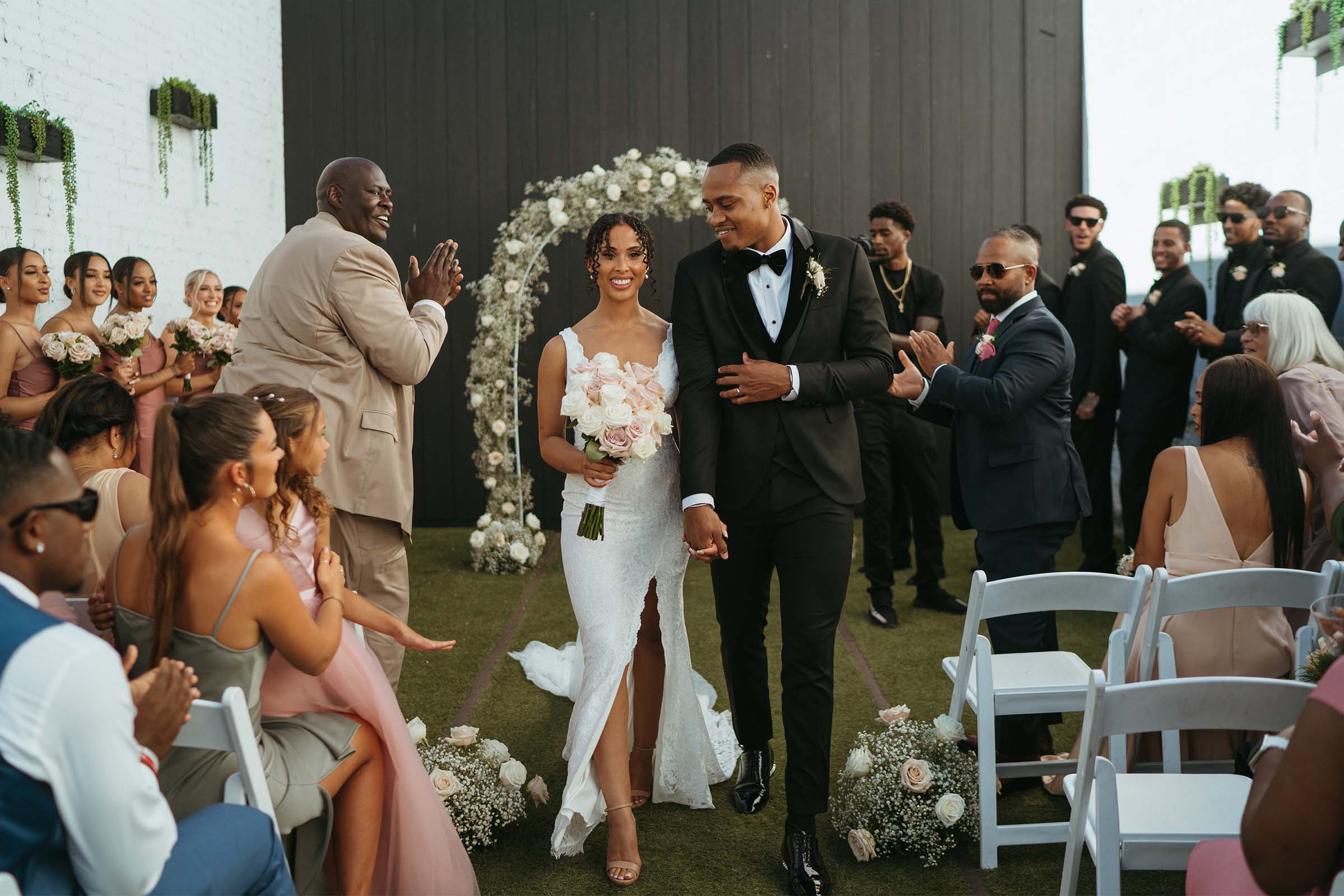 Bride and groom walking down the aisle