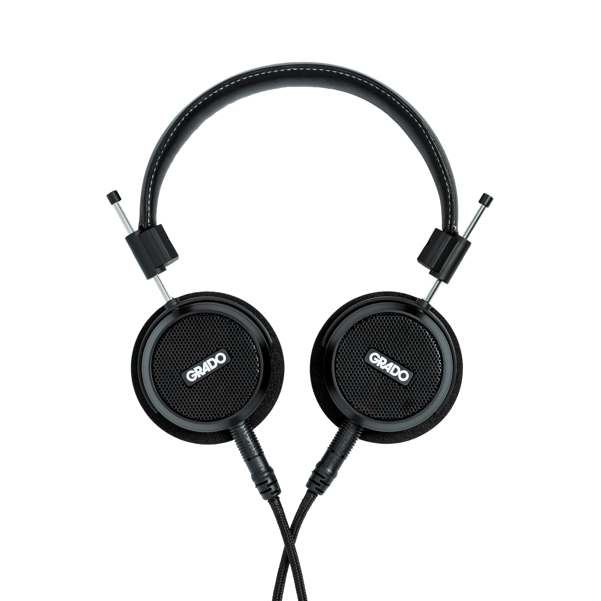 Photo of Grado S150 Headphones on a white background taken from the top - both the left and right ear cups can be seen and have the Grado logo in the center - the black cables can be seen coming out of the headphone.