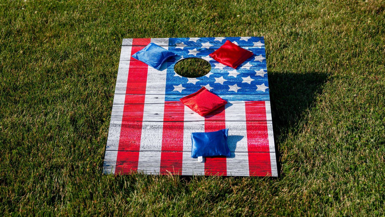 American Flag cornhole game with red and blue bean bags