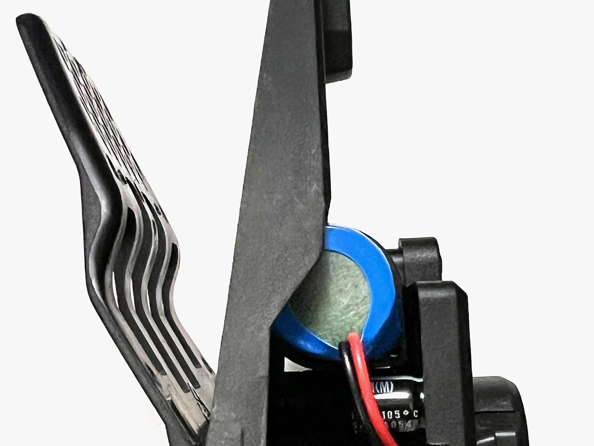 Close-up of the DRV showing wires and a blue component.