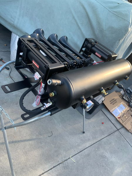 Black HornBlasters train horn assembly with dual Viair compressors, air tank, and four trumpets on stand