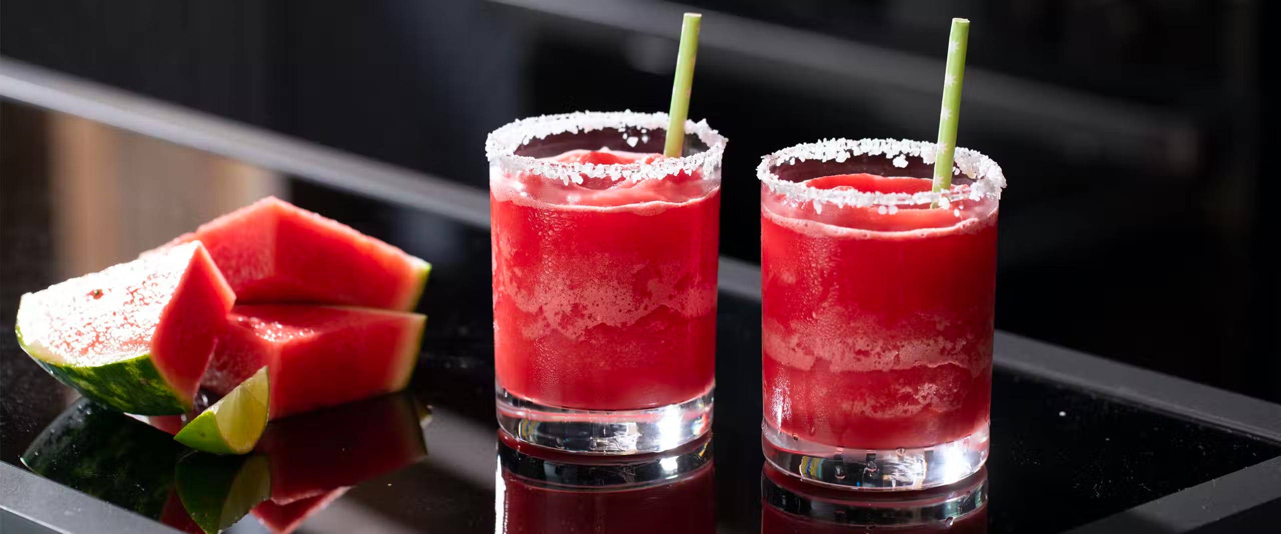 Two glasses of Frozen Watermelon Margaritas on Haier  kitchen counter