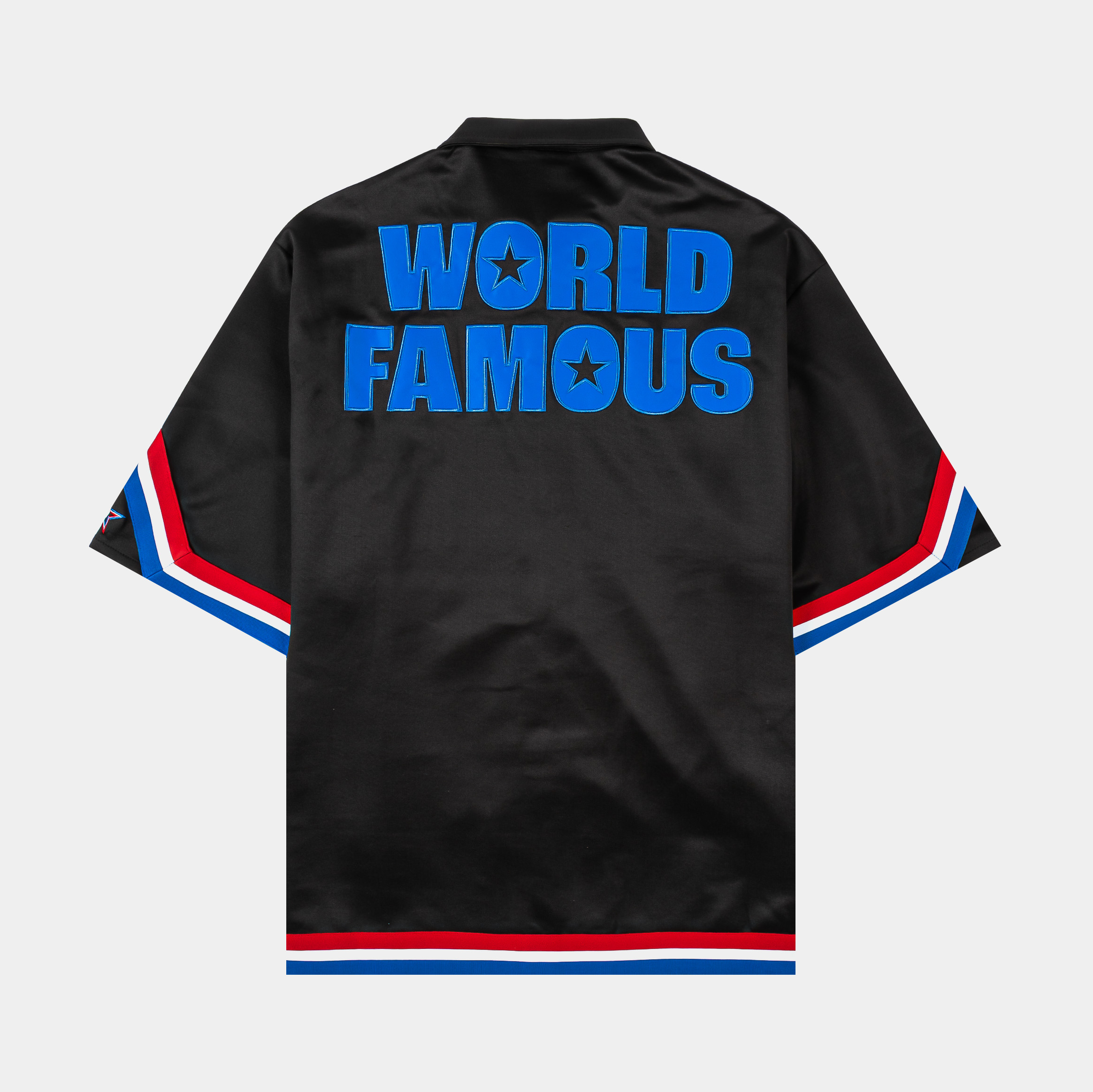 Harlem Globetrotters black jersey with red and blue accents.