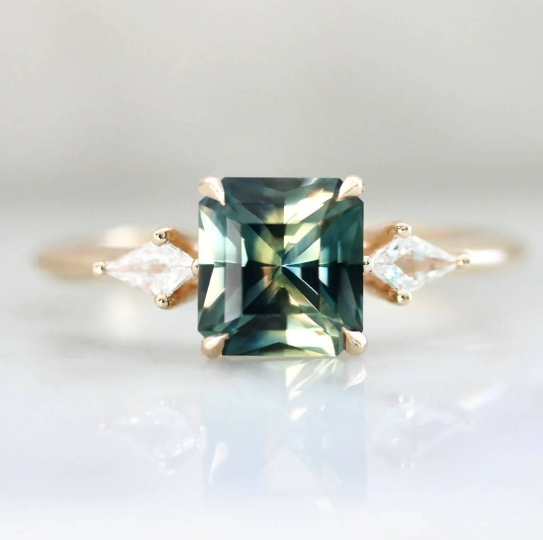 green sapphire emerald cut 3 stone engagement ring