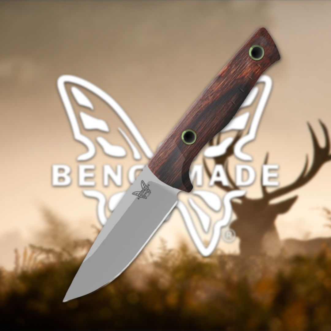 A knife with a wooden handle against a blurred nature background.