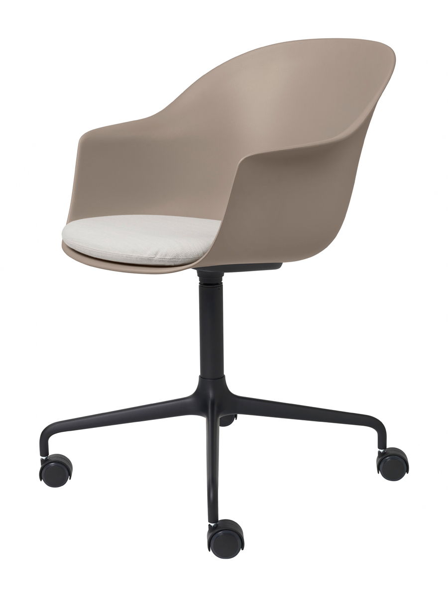 Modern Bat swivel chair by Gubi with a beige seat and black rolling base.