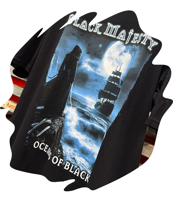 Index screen printed “Black Majesty - Oceans of Black” album artwork on black t-shirt featuring a ship and moonlit ocean in blue, grey and white inks with high contrast tonal detail