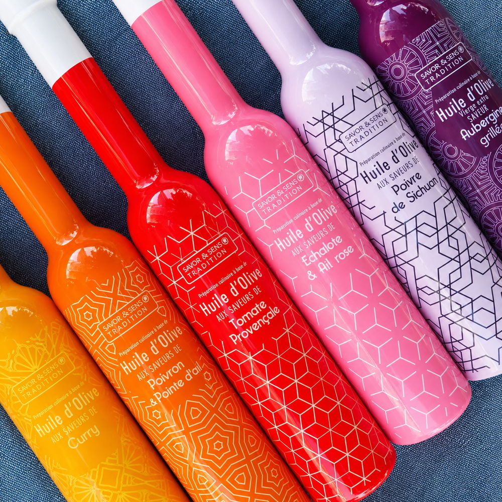 Colorful shampoo bottles arranged in a row on a blue background.