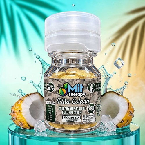 Bottle of Mit Therapy Pina Colada with tropical fruits and water droplets.