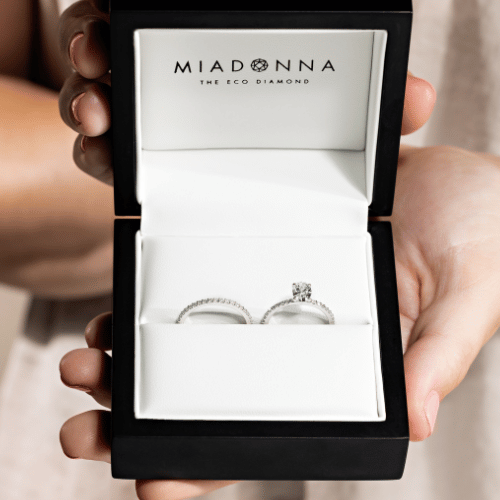 lab grown diamond accented engagement ring with matching wedding band  in jewelry box by MiaDonna