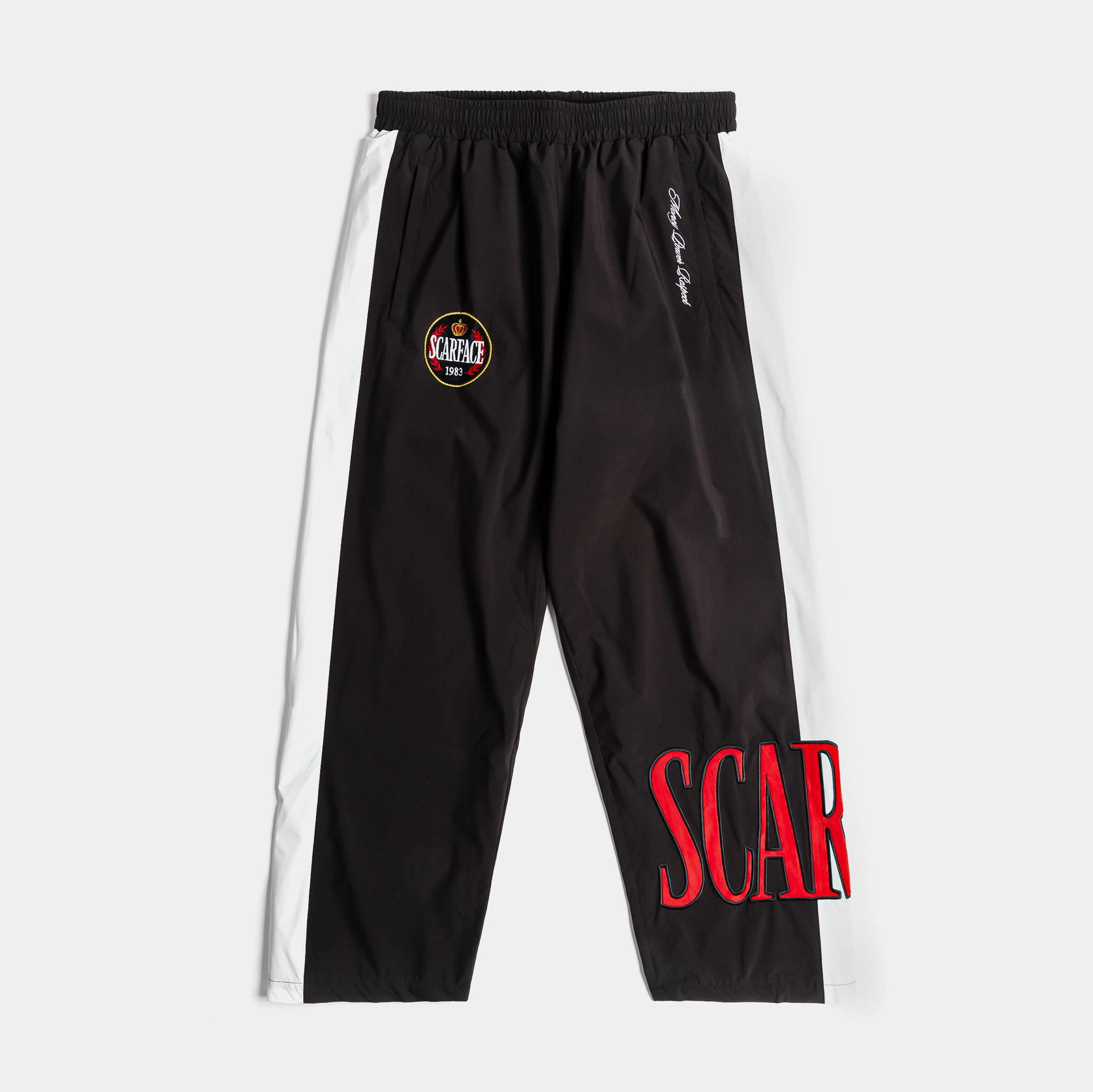 Black athletic pants with white stripes and a logo.