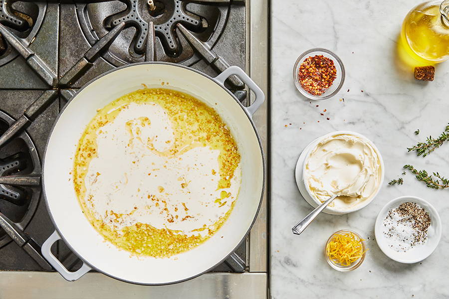 Heavy cream stirred with oil and garlic.