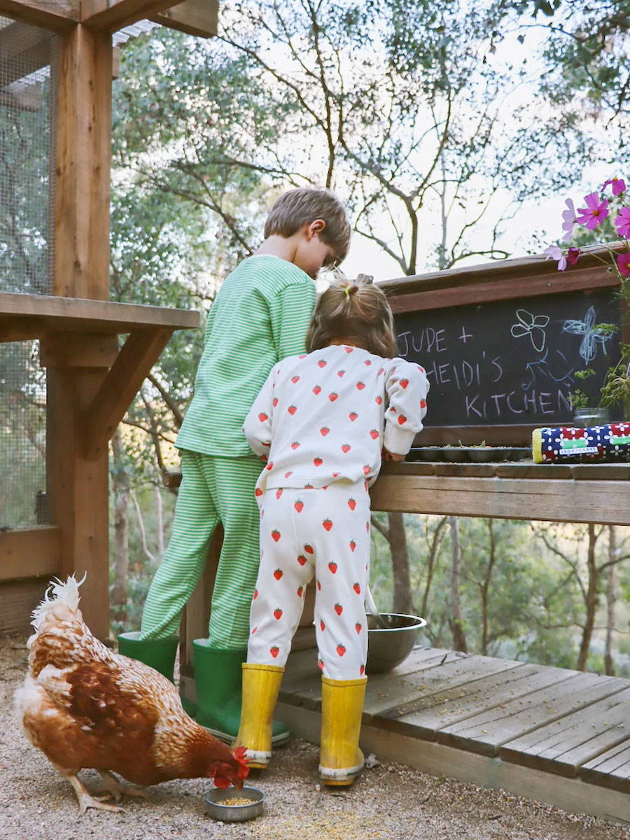 Children playing with a mud kitchen