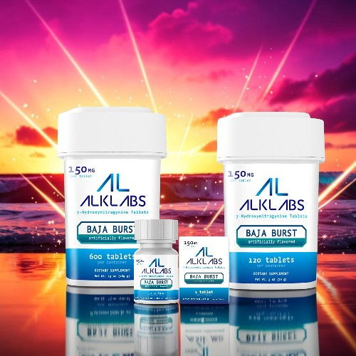 Bottles of ALKLABS data burst products against a colorful sunset background.