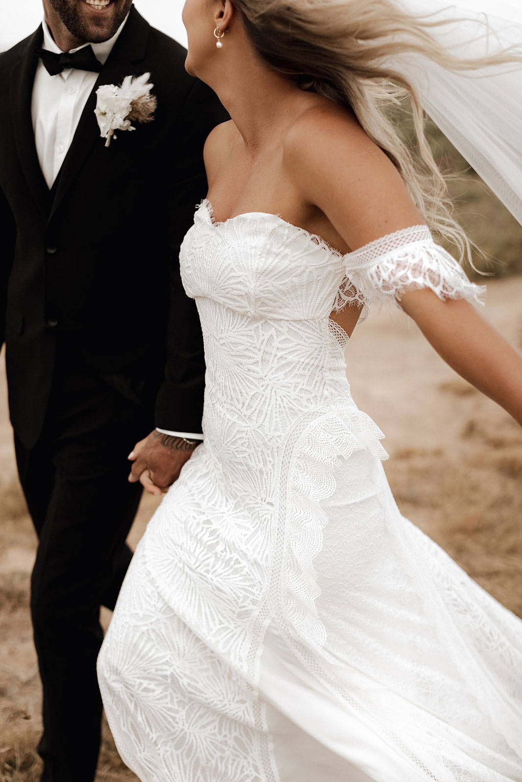 Bride wearing the Grace Loves Lace Noah Gown