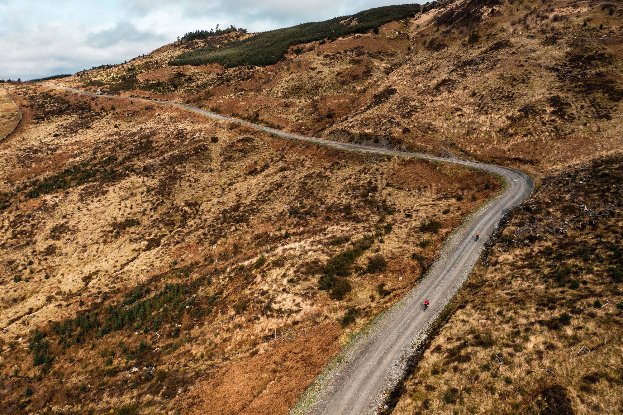 Cyclists on a windy trail