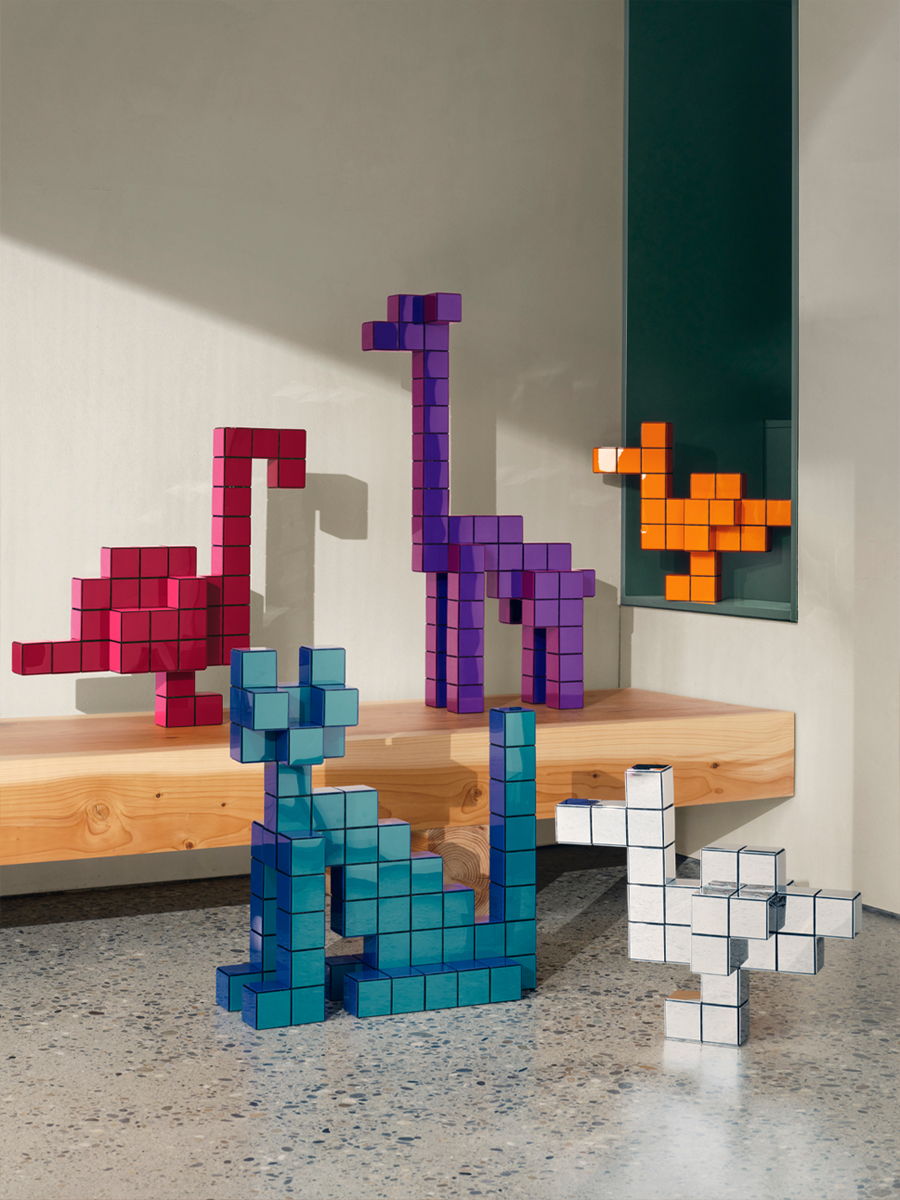 Colorful Vitra Panton block animals arranged on a shelf in a modern setting.