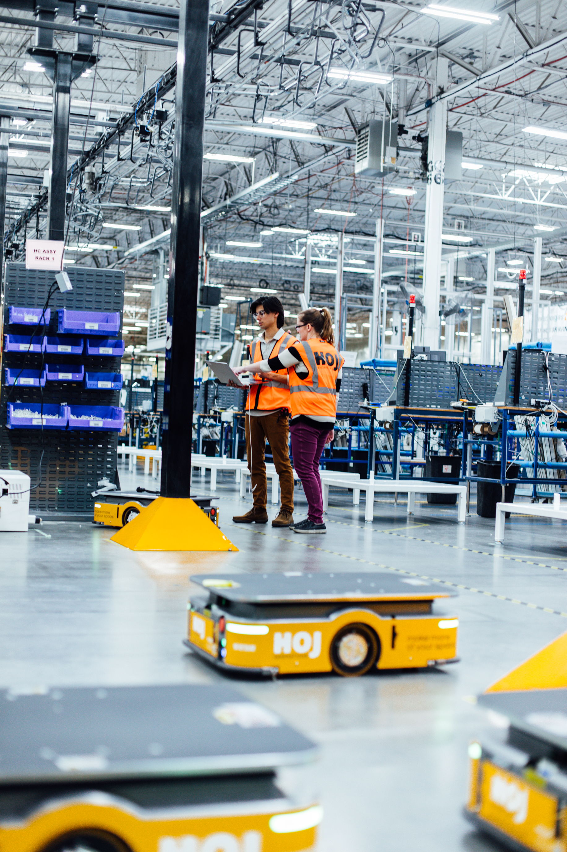 2 hoj engineers troubleshooting AMR Robots