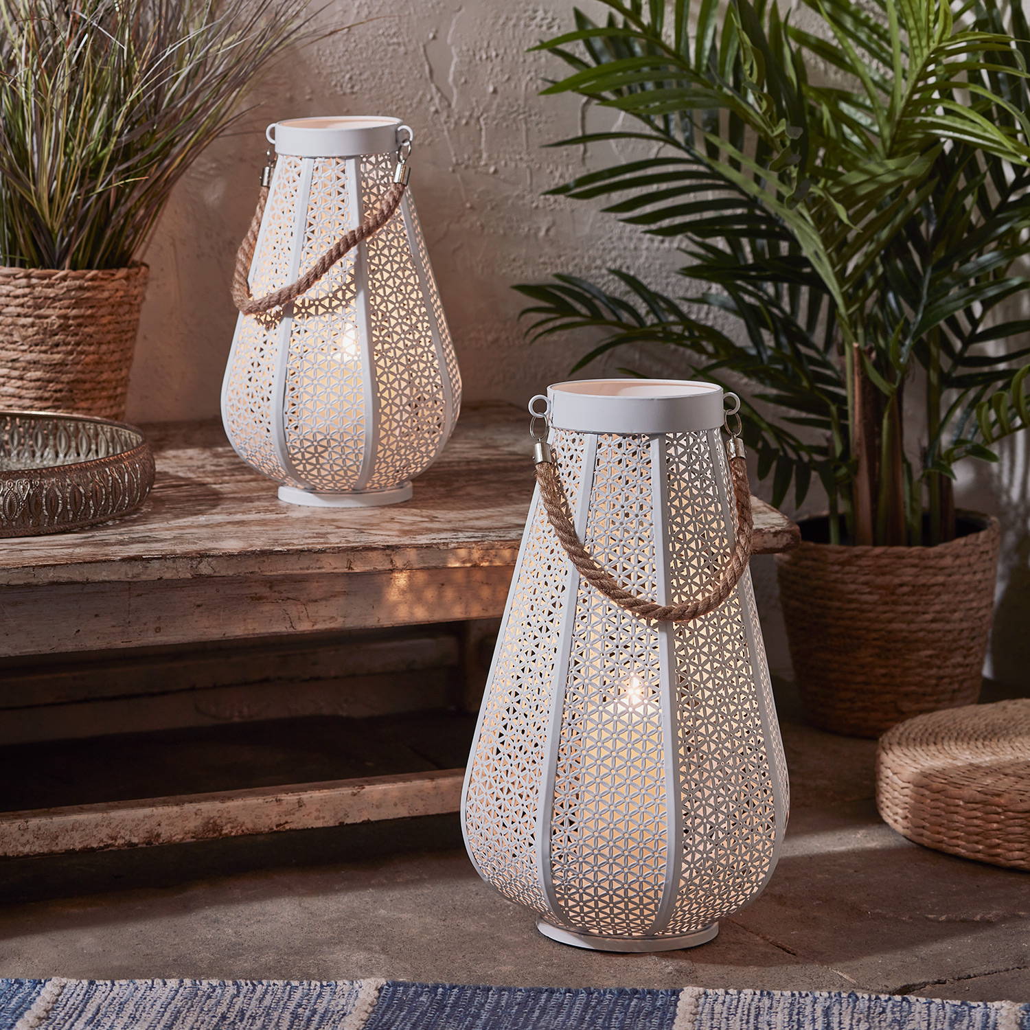 Duo of outdoor lanterns, part of a rustic display