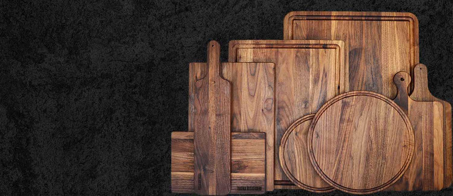 A collection of walnut wood boards that are perfect for plating charcuterie
