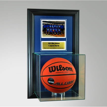 Basketball memorabilia display case with a frame and engraved plaque.