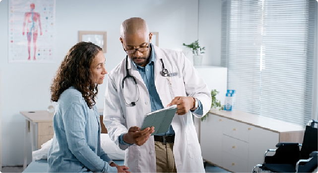 A doctor discussing health information with a patient.