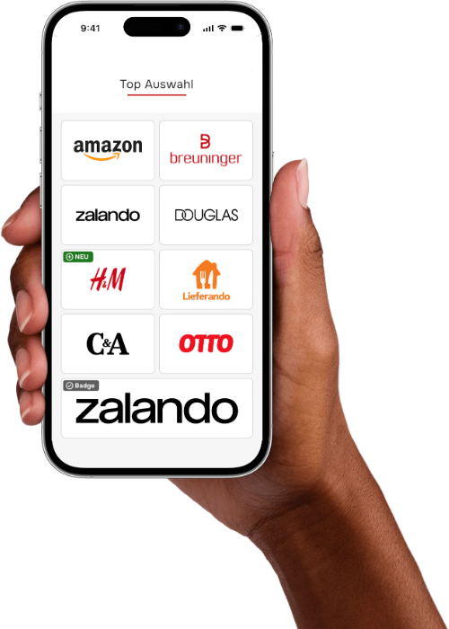 Hand holding a smartphone displaying various brand logos.