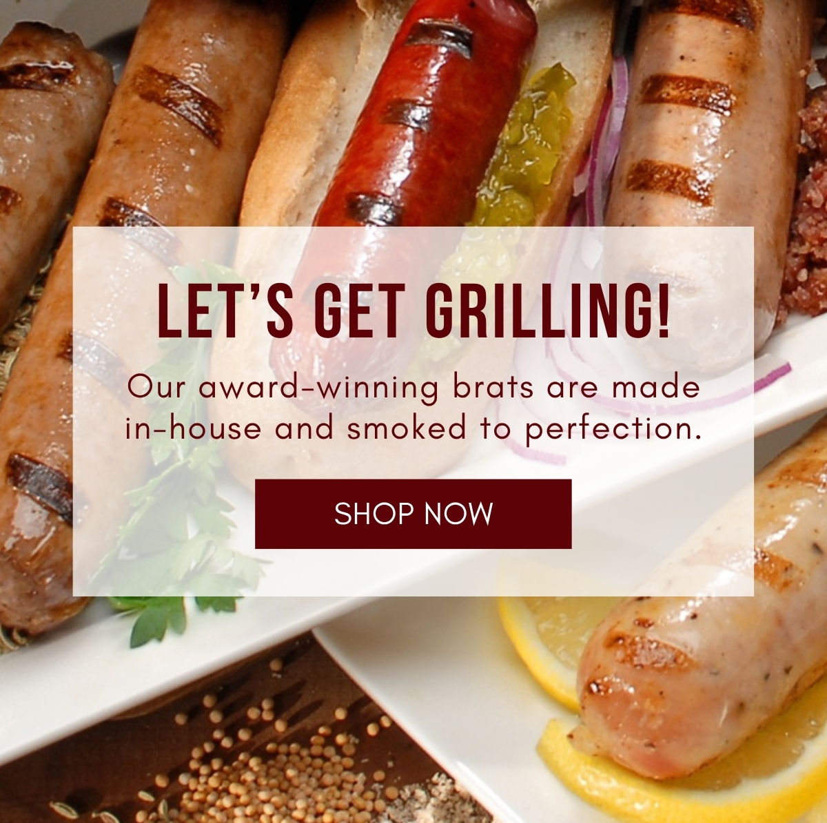 Grilled bratwursts and sausages on a white platter