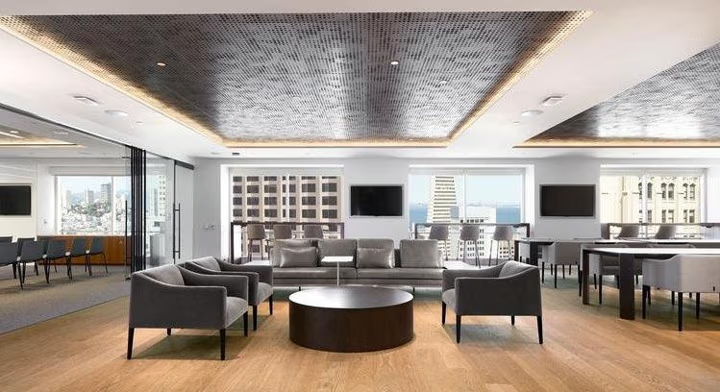 Financial Institution AV Modern lounge area with comfortable seating and large windows.