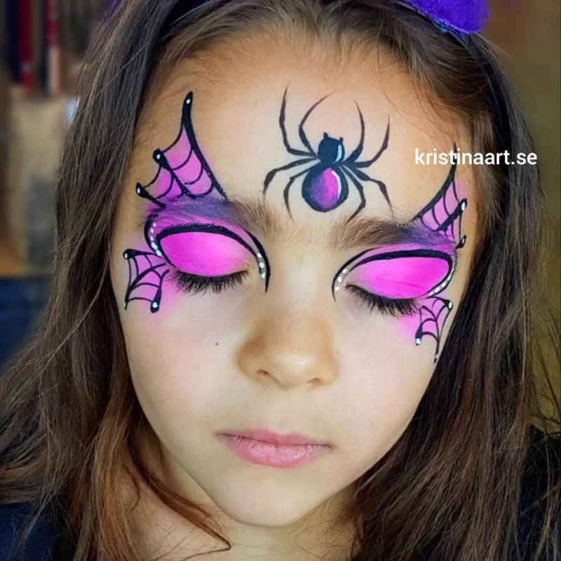 spider face paint mask girl with web