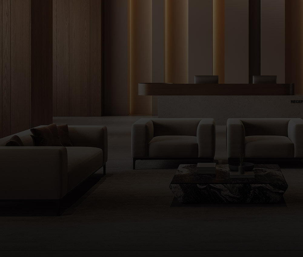 Modern hotel lobby with seating area and reception desk, representing security and monitoring solutions for the hospitality industry