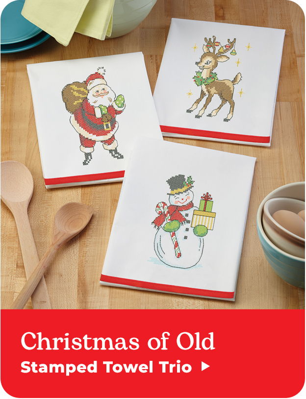 Three Christmas-themed dish towels featuring Santa, a reindeer, and a snowman.