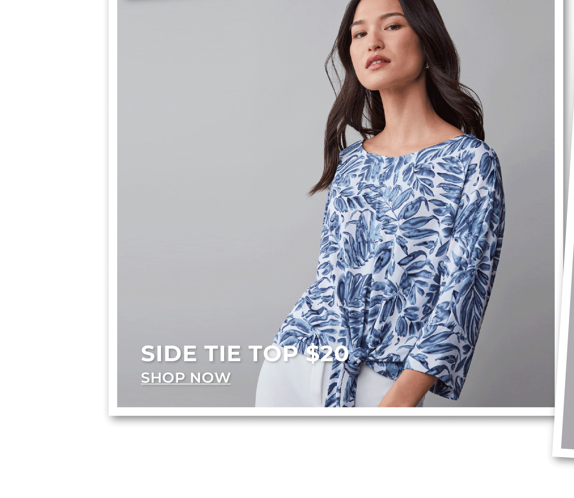 Woman in blue floral print top. Side tie top $20.